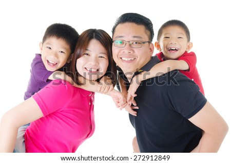Indoor portrait of asian family Royalty-Free Stock Photo #272912849