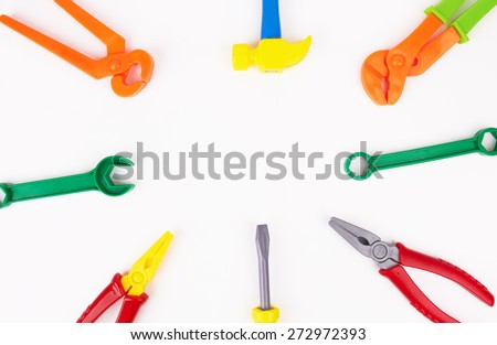 toy tools plastic color on a white background 