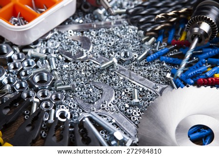Working tools on wooden background