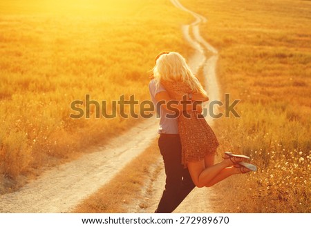 Love Couple in love romantic road summer field happy Royalty-Free Stock Photo #272989670