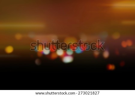 abstract blurred circular bokeh background of moving city night light with filtered color.