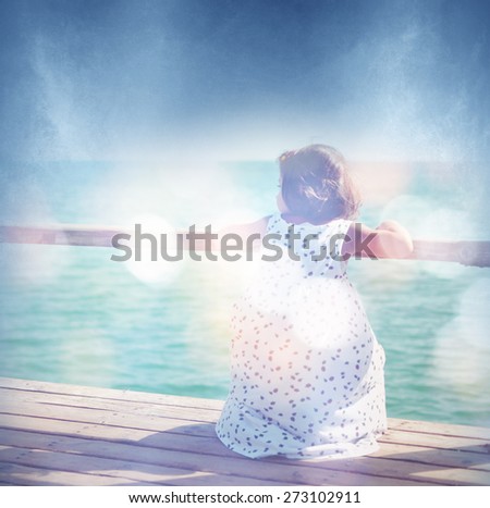 	girl at sea, defocused image