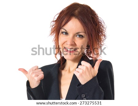 Redhead girl with thumb up 