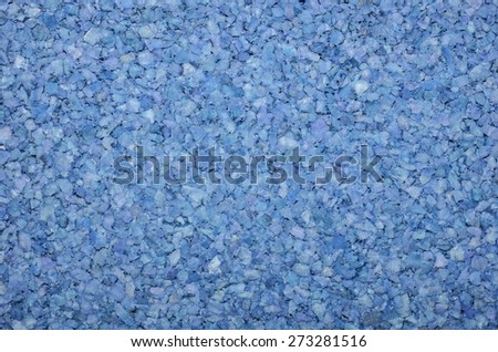 colored blue cork texture - closeup. cork board background