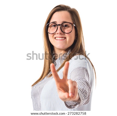 Girl doing victory gesture