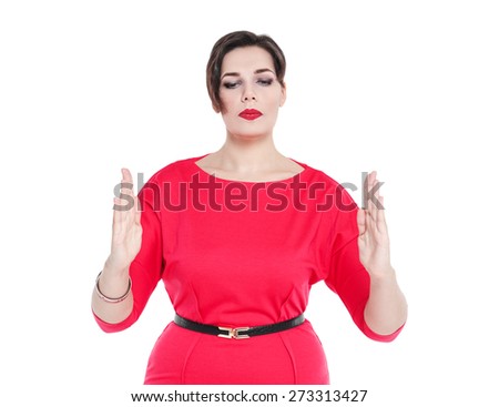 Beautiful plus size woman making size gesture isolated on white background