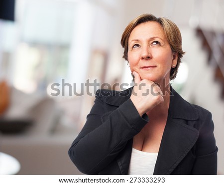 portrait of a mature business woman thinking about something