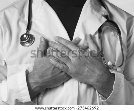 Male medical staff with hands crossed