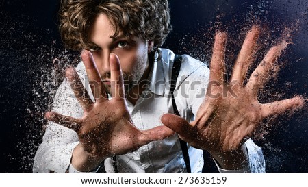image of a man who performs magic with his hands