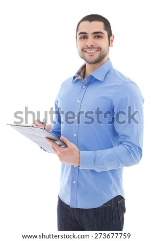 young arabic man writing something on clipboard isolated on white background