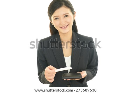 Business woman holding business card