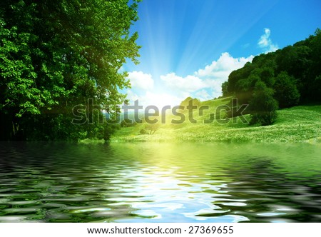 beautiful mountain valley reflection on river surface Royalty-Free Stock Photo #27369655