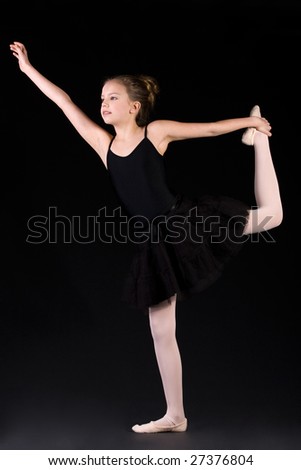 Young ballet girl with some artistic movements