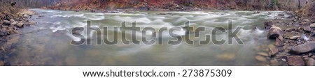 Mountain River Black Cheremosh about Verhovina fast flowing and rocky rapids, Carpathian region - early spring. Ecologically clean water wild mountains around, amid beech and spruce forests and stones