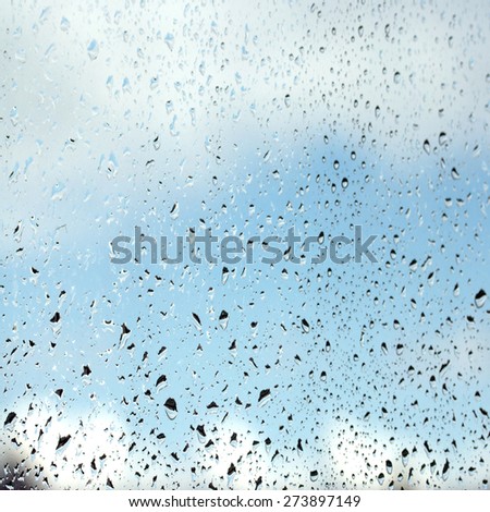 Rain water drops on glass