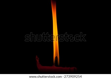 Closeup of a candle with black background