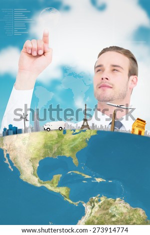 Cheerful businessman pointing with his finger against blue sky