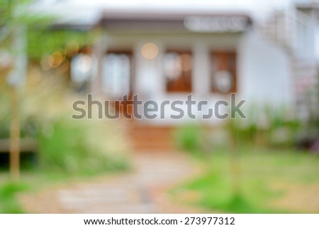 Small house in the garden blurred background. (Bokeh Background)