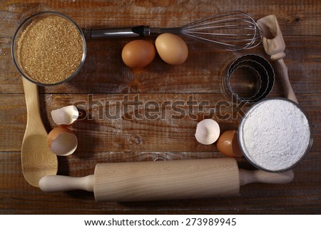 Collection frame of ingredients and appliances for cooking on wooden table top copyspace, horizontal picture