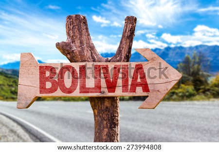 Bolivia wooden sign with road background