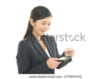 Business woman holding a business card