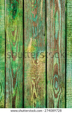 Texture of old wooden planks with peeling paint