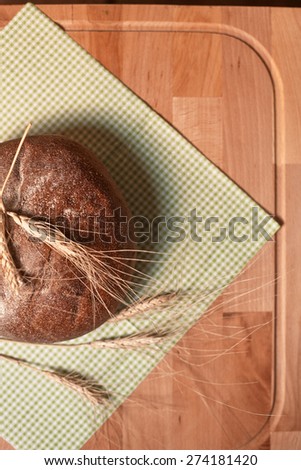 bread with wheats on table