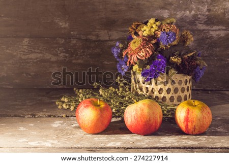 still life Ripe red apples on wooden background