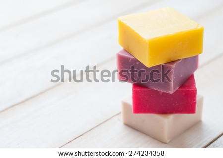 natural soap on bright wooden background