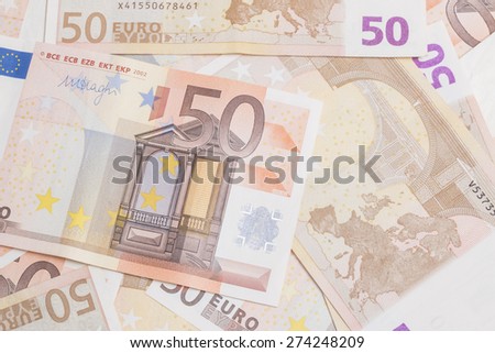 Closeup of a group of fifty euros banknote background