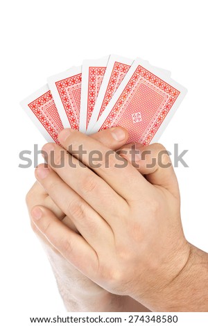 Hands with playing cards isolated on white background