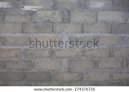 Grey brick wall closeup texture - Grey background