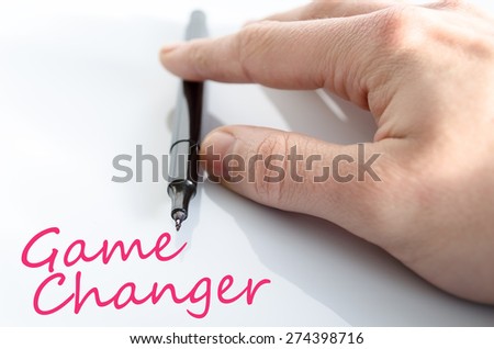 Pen in the hand isolated over white background game changer concept
