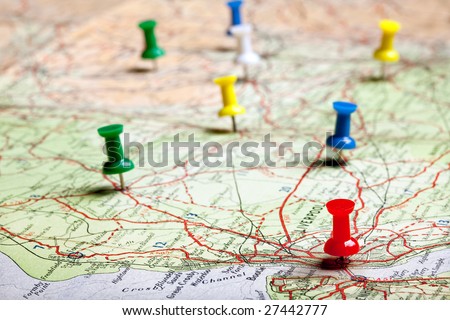 Several pushpins on a road-map of a tourist Royalty-Free Stock Photo #27442777