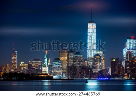 New York City and its three iconic landmarks: Statue of Liberty, Freedom Tower and Empire State Building in a single real image. Royalty-Free Stock Photo #274465769