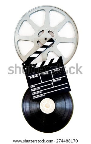 Movie clapper on two 35mm film reels isolated on white background vertical