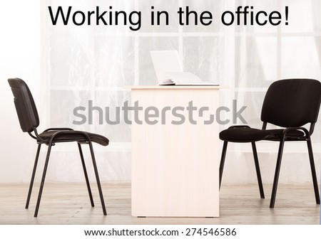 Ad new job in the office. Office space, a table and two chairs. Office empty without people. People went to the census. Laptop and notebook for notes on the table.