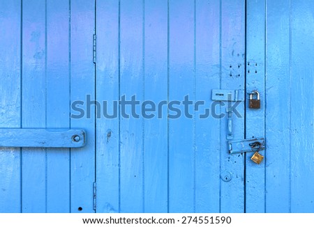 Closeup wooden blue door background
