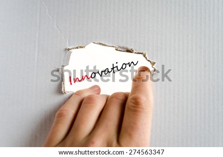 Hand on the cardboard background innovation concept