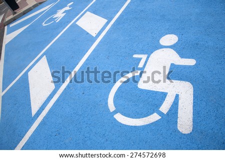 Blue and White Disabled Parking Sign