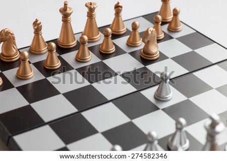 chess board with black and white figures