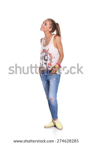 Young woman standing full length isolated on white background.