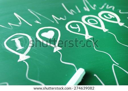 Children drawings on school blackboard background