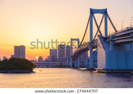 Beautiful Sunset View of Tokyo Skyline and Rainbow Bridge 