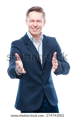 Congratulations! Welcoming sign.Handsome young businessman with opened hands. Isolated on white.