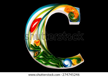 Handmade letter from flower quilling alphabet. isolated on black including clipping path
