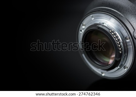 Photographer Camera Lens isolated on black background