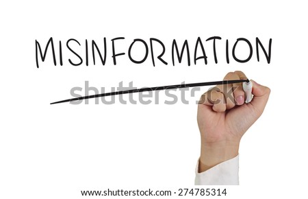 Business concept image of a hand holding marker and write Misinformation isolated on white Royalty-Free Stock Photo #274785314