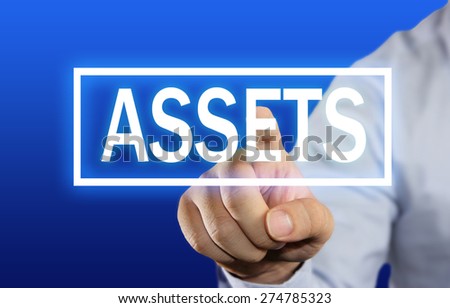 Business concept image of a businessman clicking Assets button on virtual screen over blue background