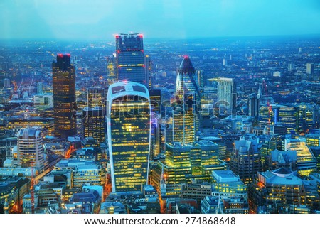 Aerial overview of the City of London financial district at night
